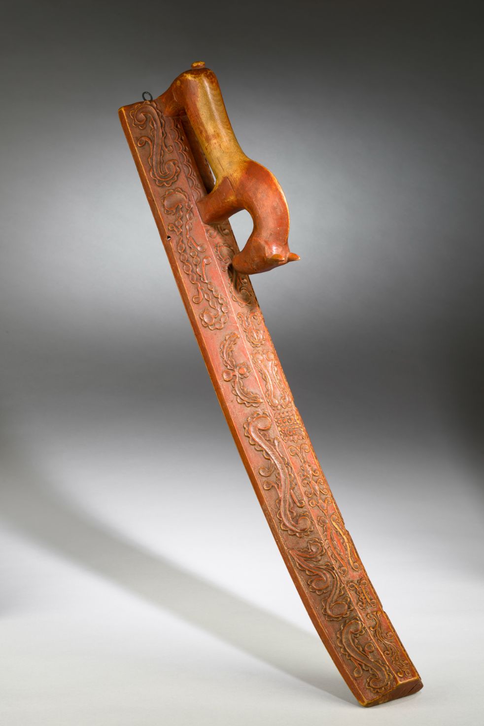 A Finely Carved Love Token Horse Handled Mangleboard