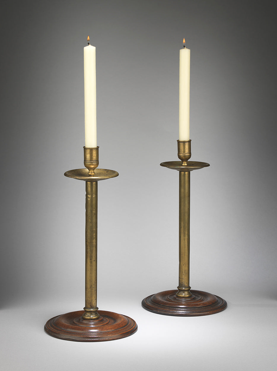 A Notable Pair of Georgian Seemed Stem Brass Candlesticks