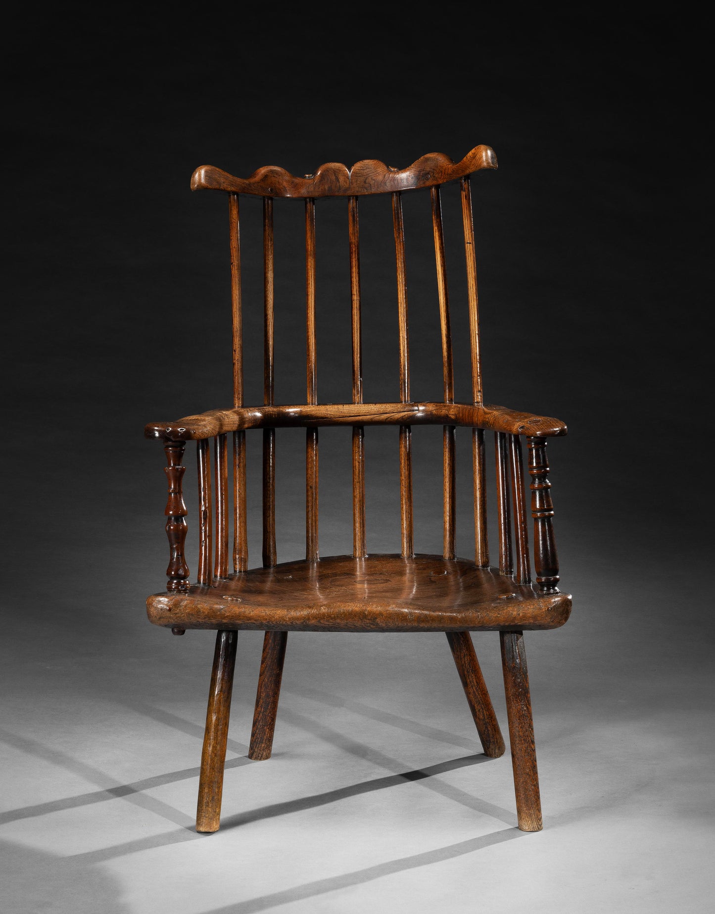 An Exceptional Primitive Comb Back Armchair