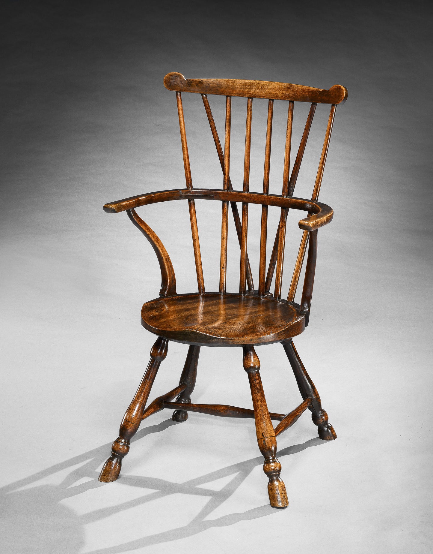 A Classic Goldsmith Style Windsor Comb Back Armchair