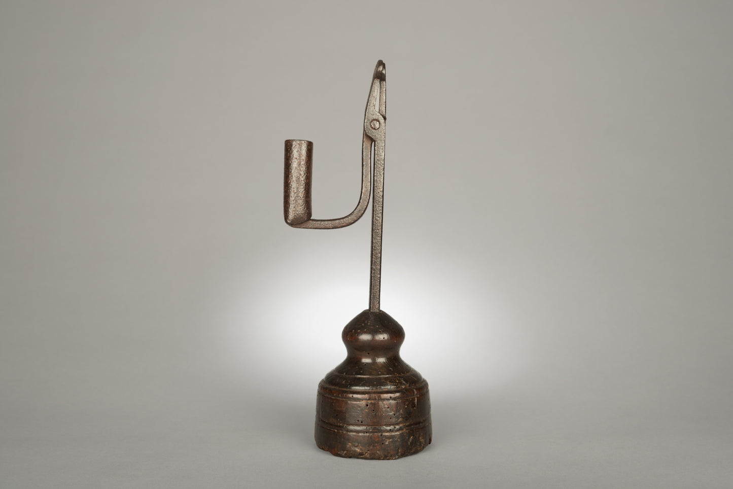 An 18th Century Vernacular Candleholder and Rush Light Nip