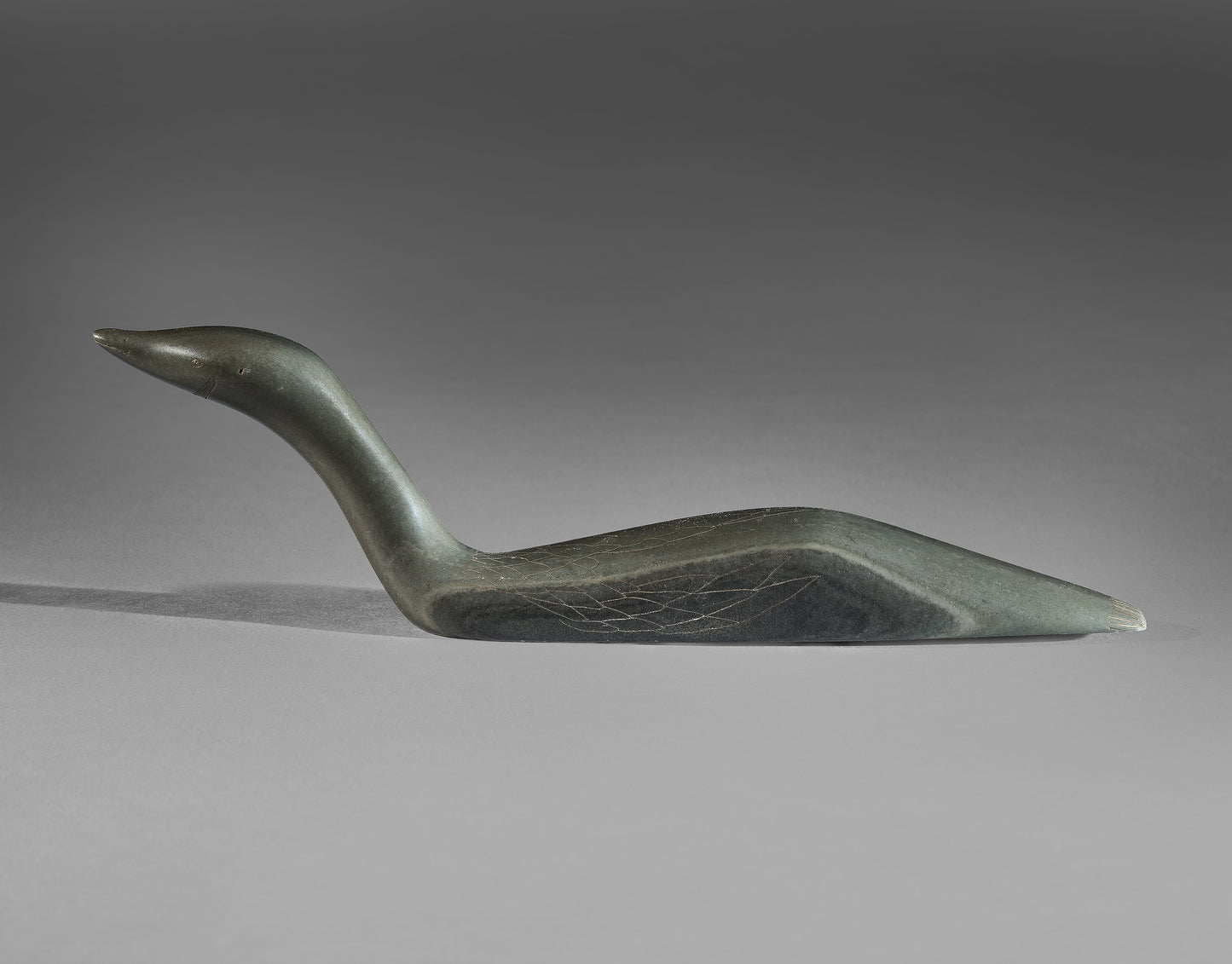Delightful Small Sculpture of a Swimming Loon