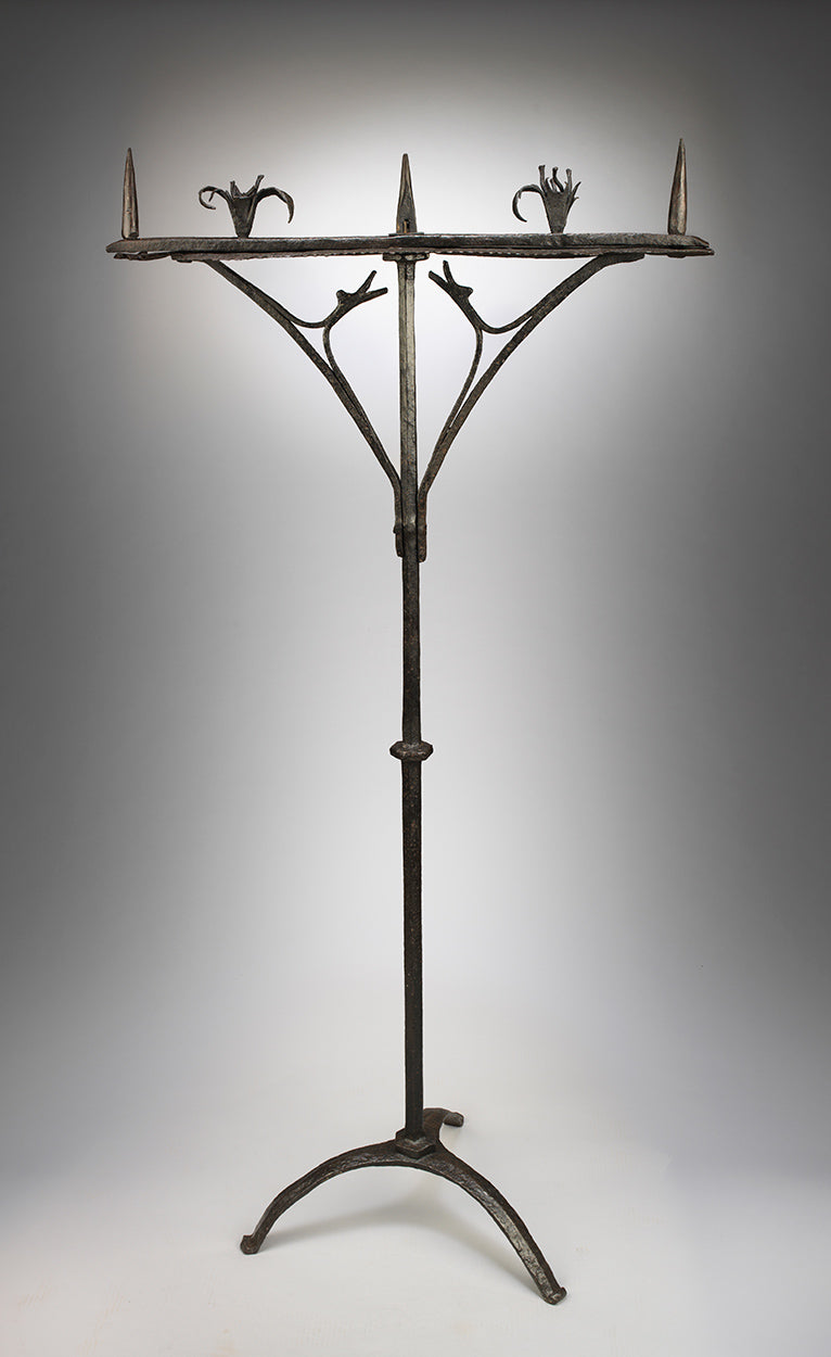 A Rare Graphically Sculptural Floor-standing Gothic Candlestick