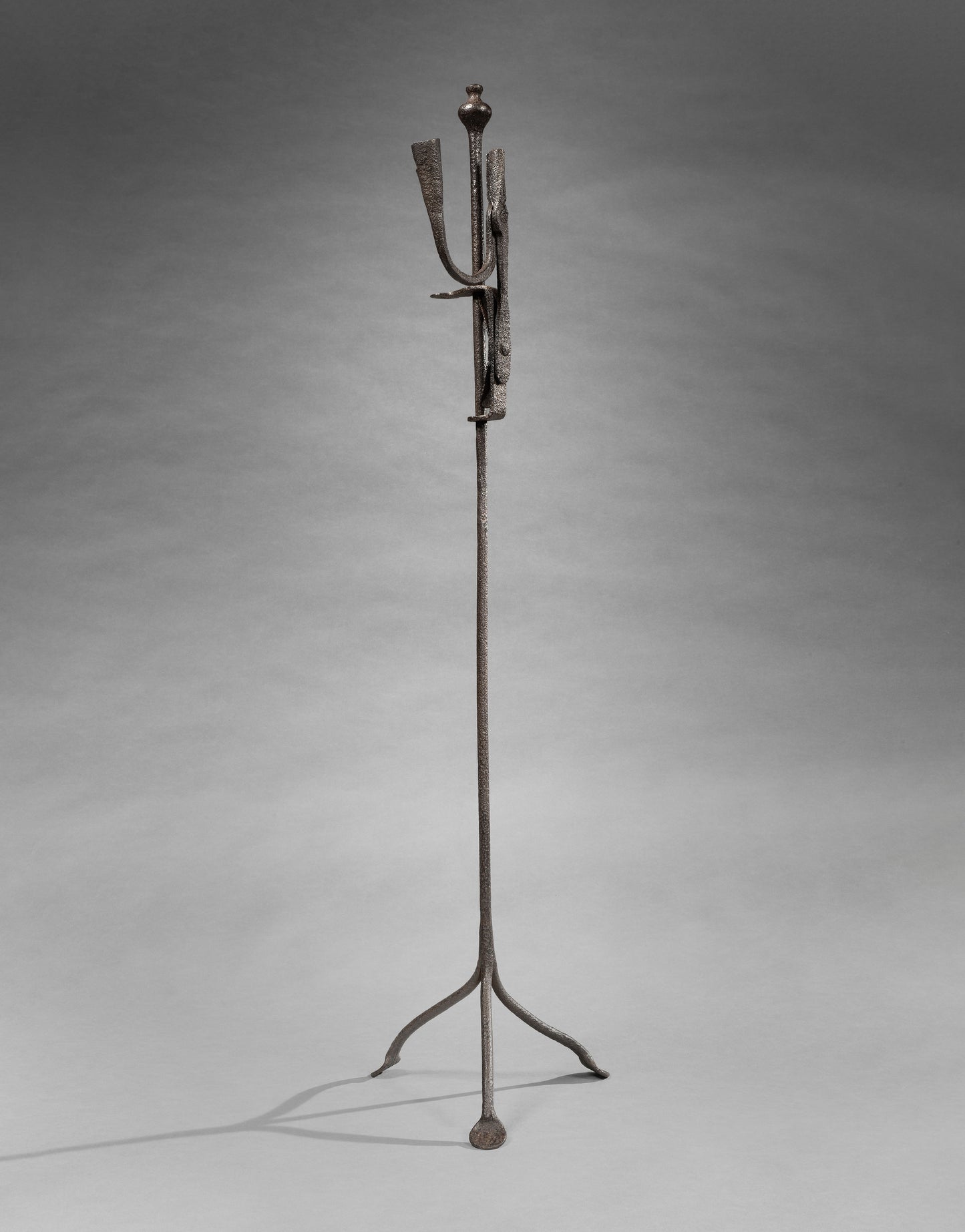 A Primitive Vernacular Floor Standing Adjustable Lighting Device