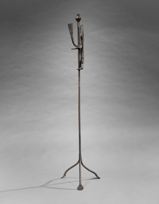 A Primitive Vernacular Floor Standing Adjustable Lighting Device