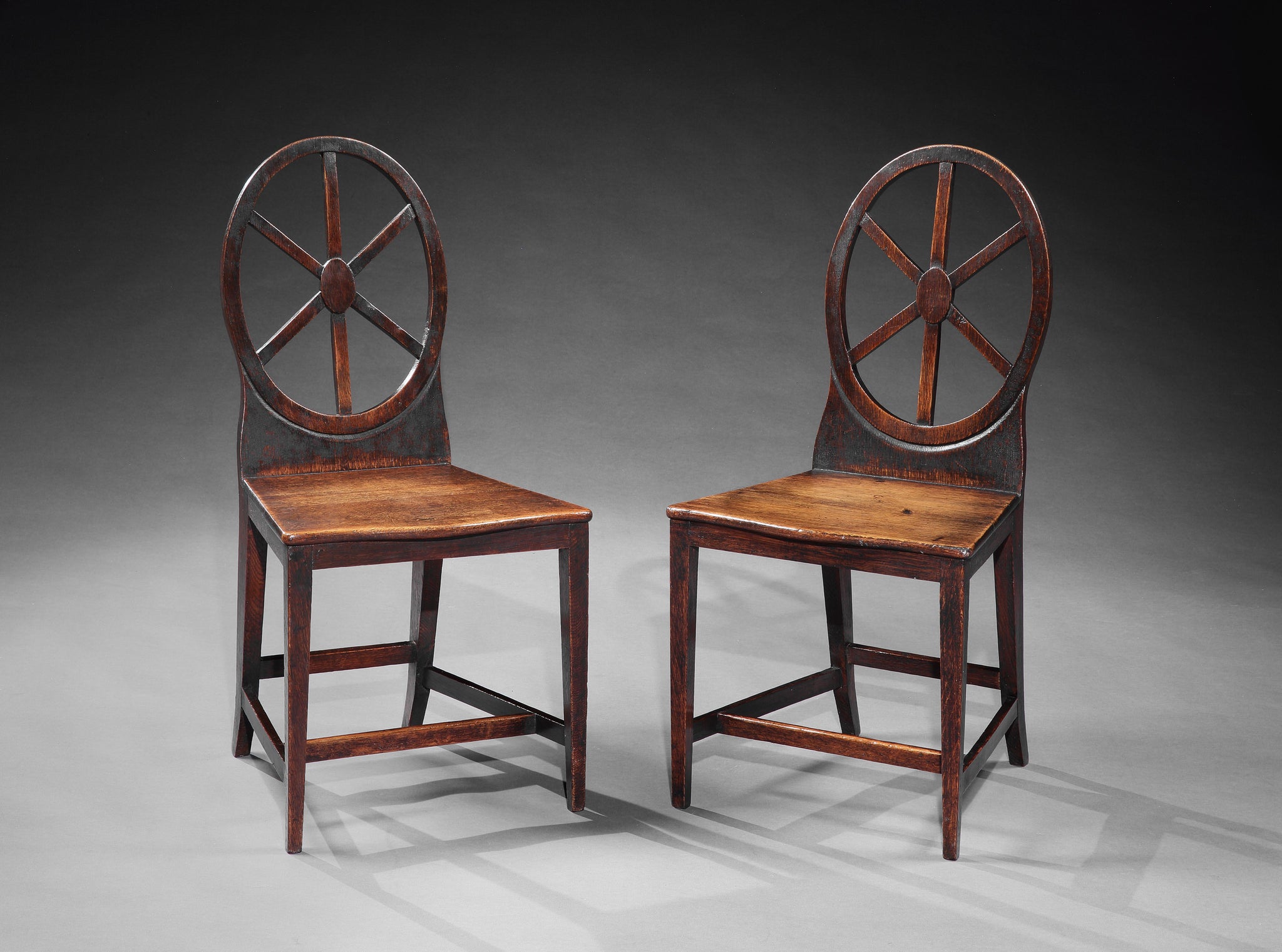 A Rare Pair of Graphic Vernacular "Wheelback" Side Chairs