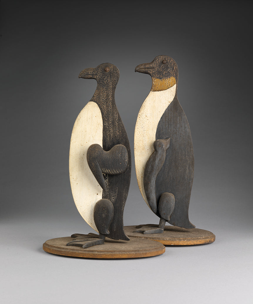 Engaging Pair of Primitive Silhouette Penguins