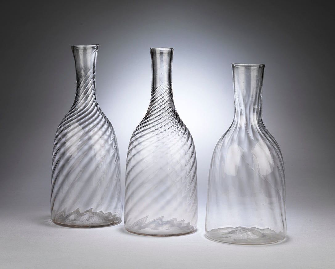 Group of Three "Spiral Twist" Glass Caraffes