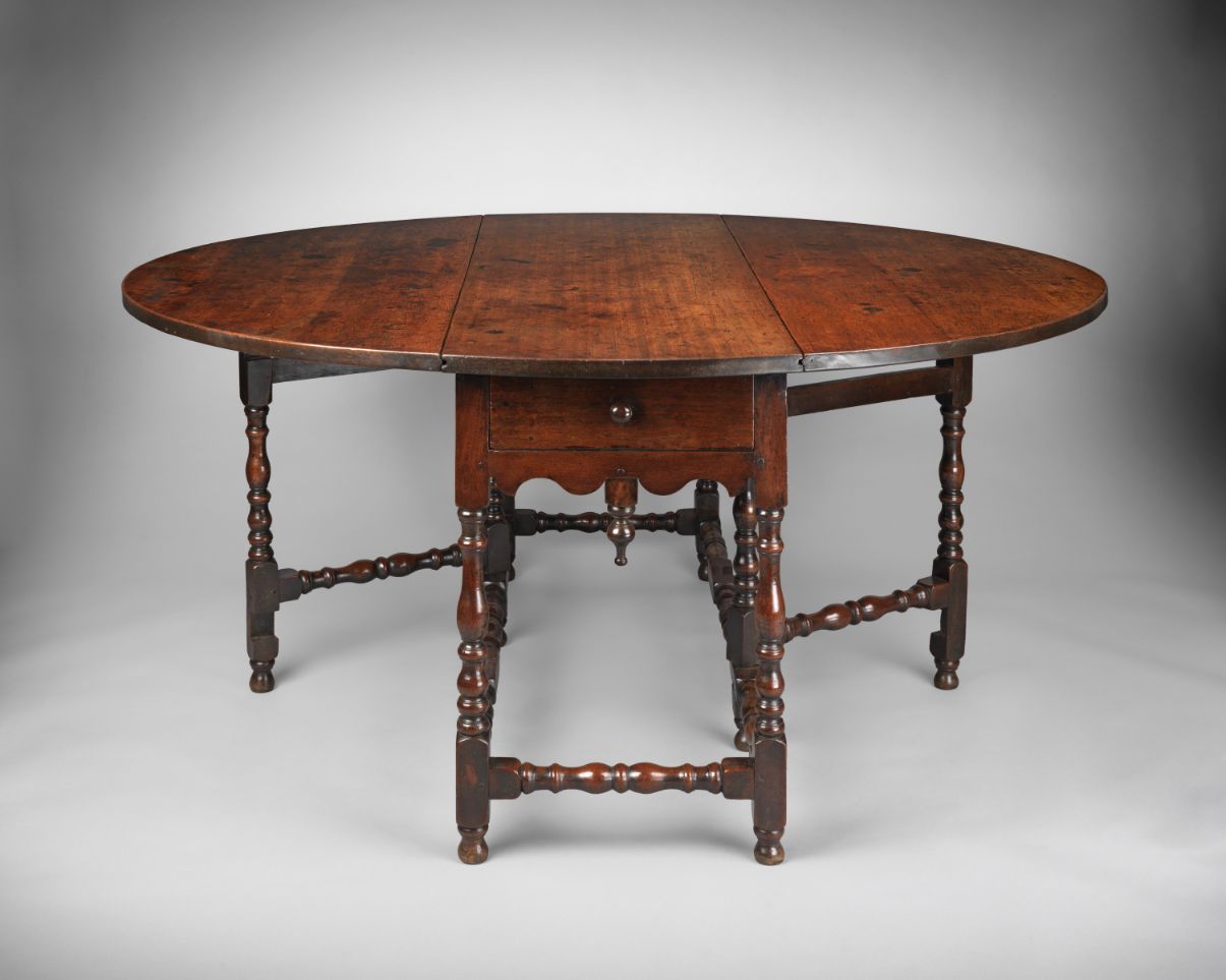 An Impressive Charles II Period Oval Drop Leaf Dining Table