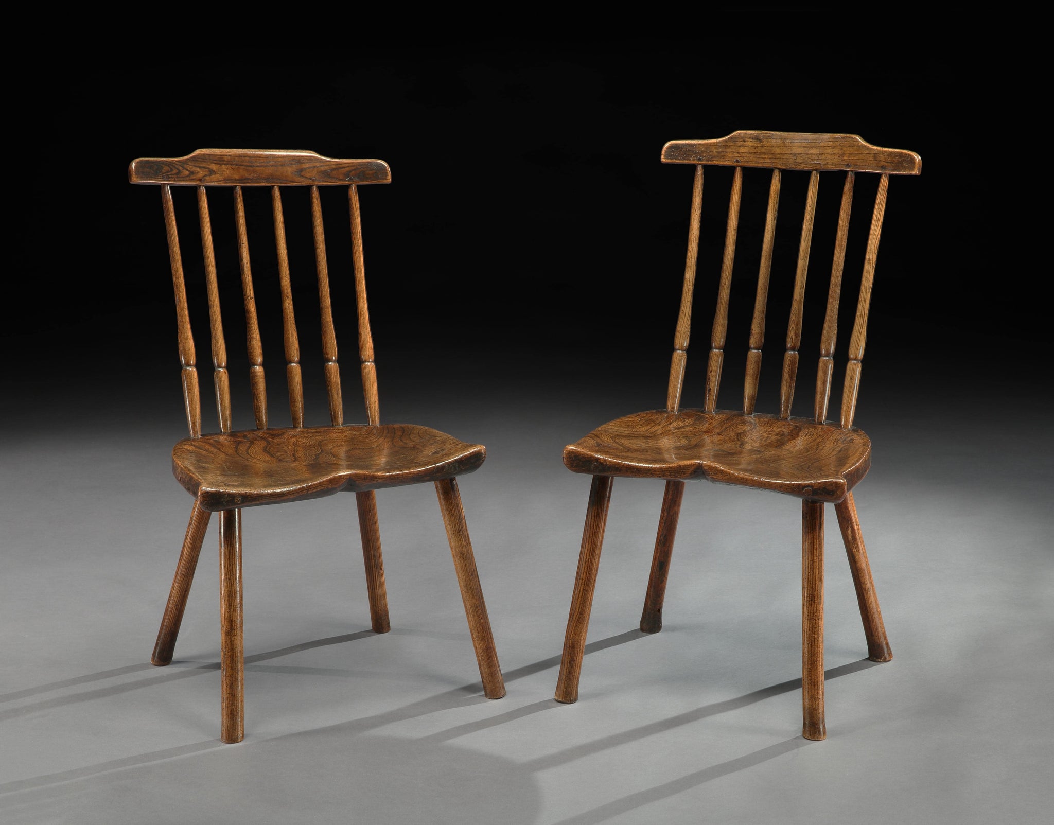 Rare and Distinctive Pair of Windsor Comb Back Side Chairs