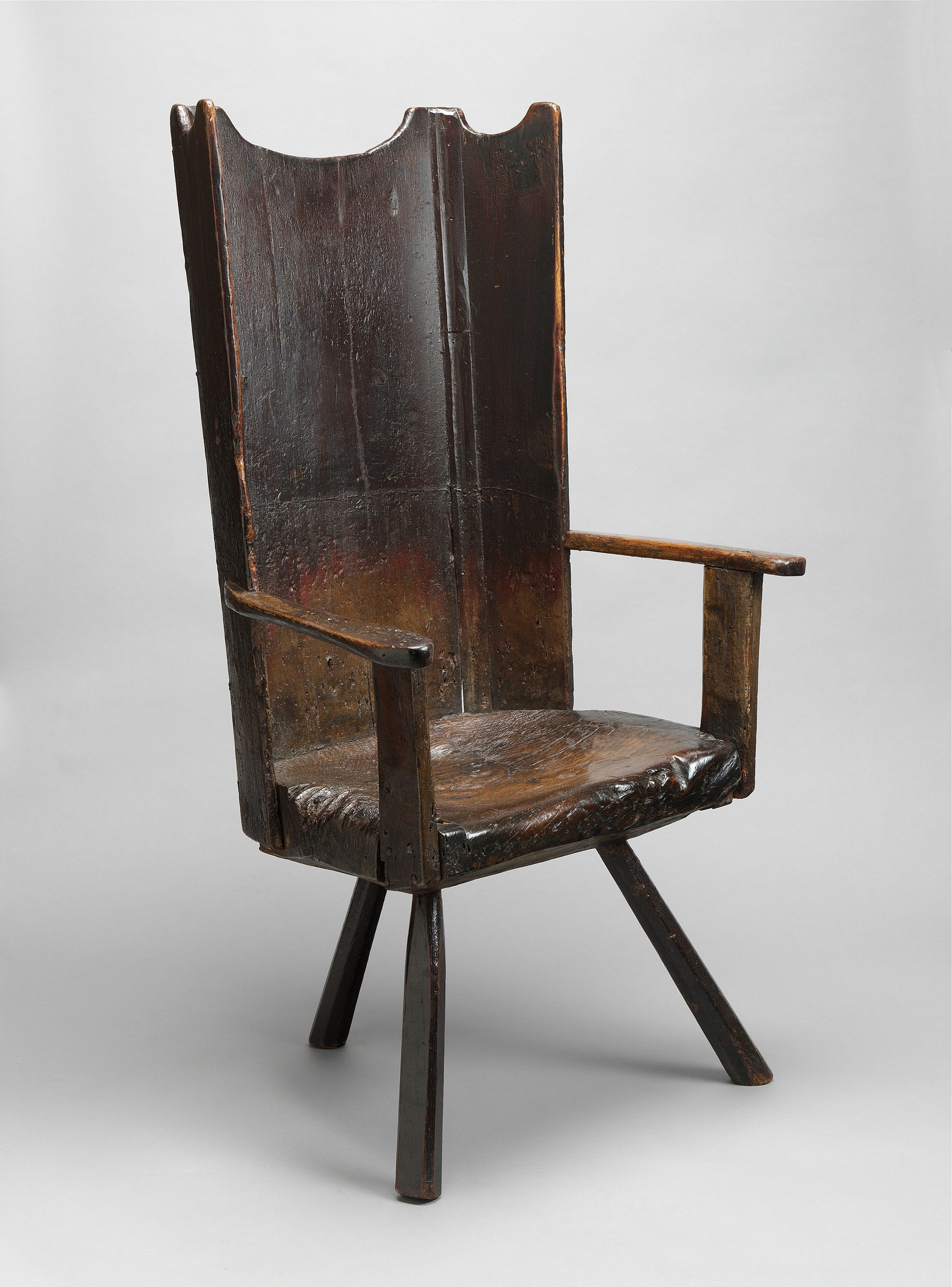 Rare and Primitive Boarded Windsor Armchair