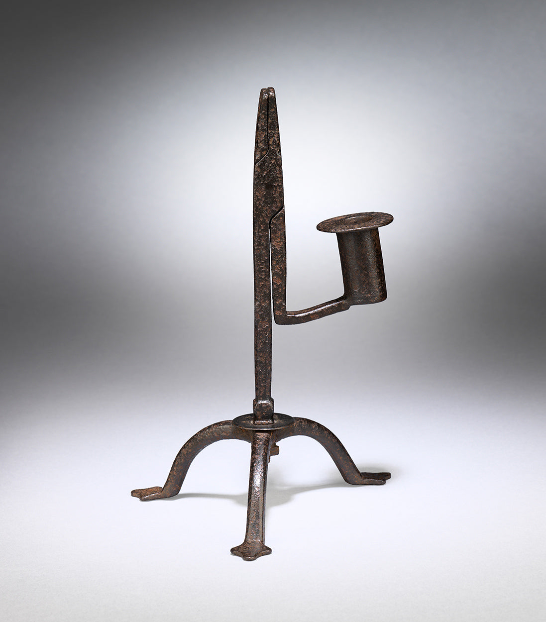 An Interesting Table Standing Tripod Rushlight and Candleholder