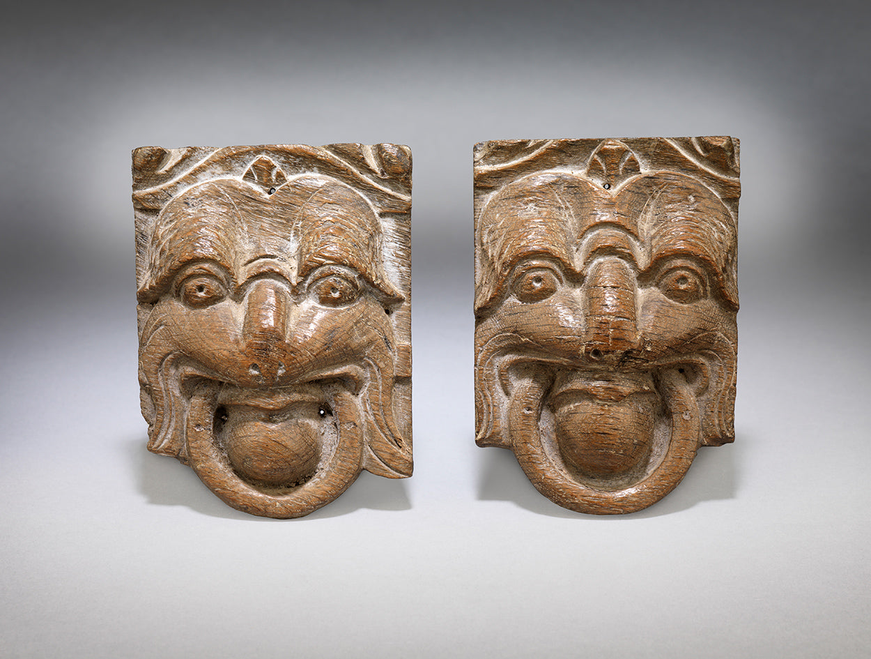 Pair of Carved Lion Masks