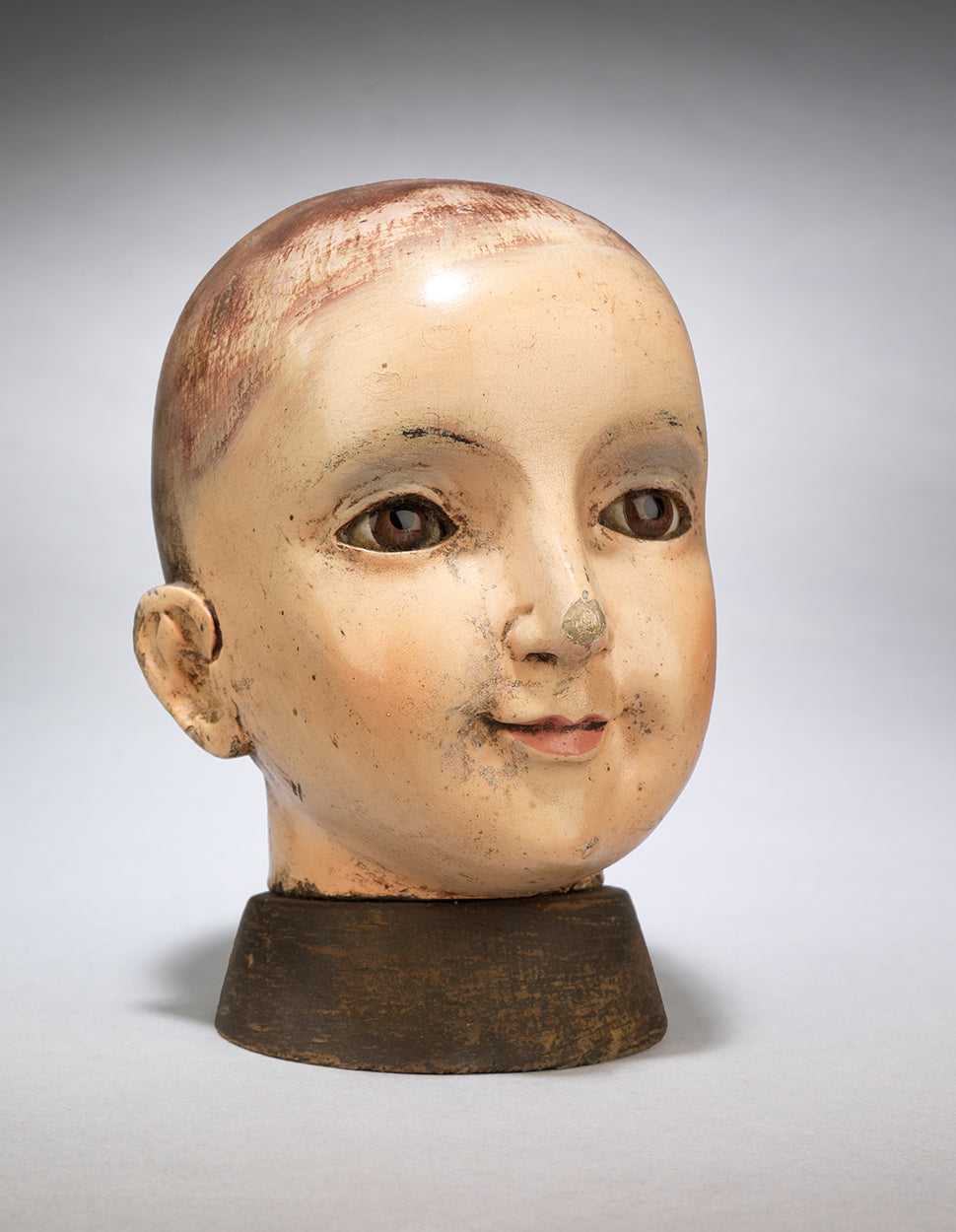 Rare and Finely Carved Early "Santos" Head