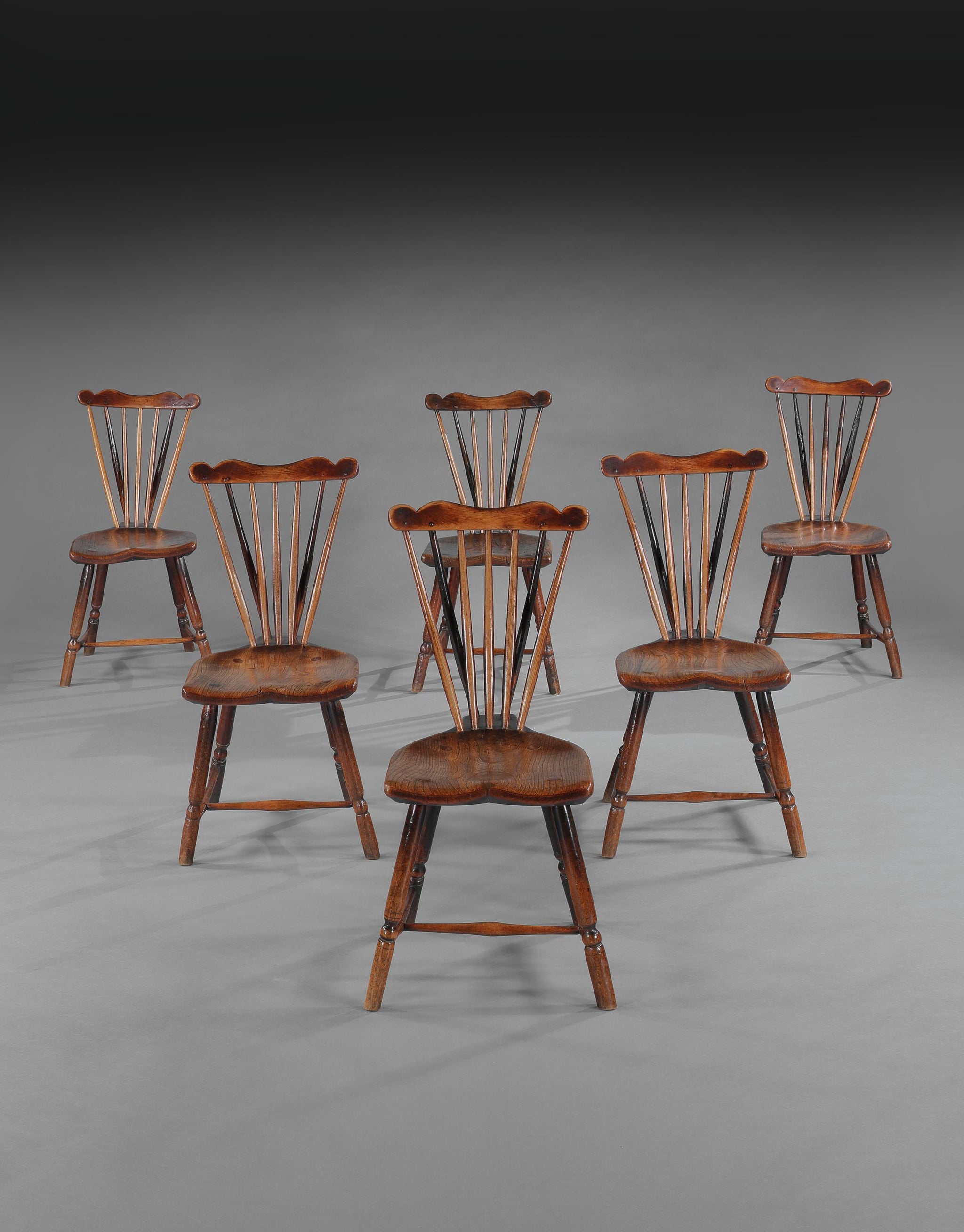 Exceptional Set of Rare Early Georgian Fan Back Windsor Chairs
