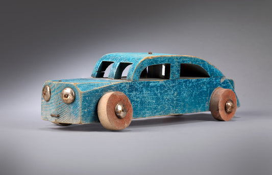 Two Stylised Vintage Toy Motor Cars