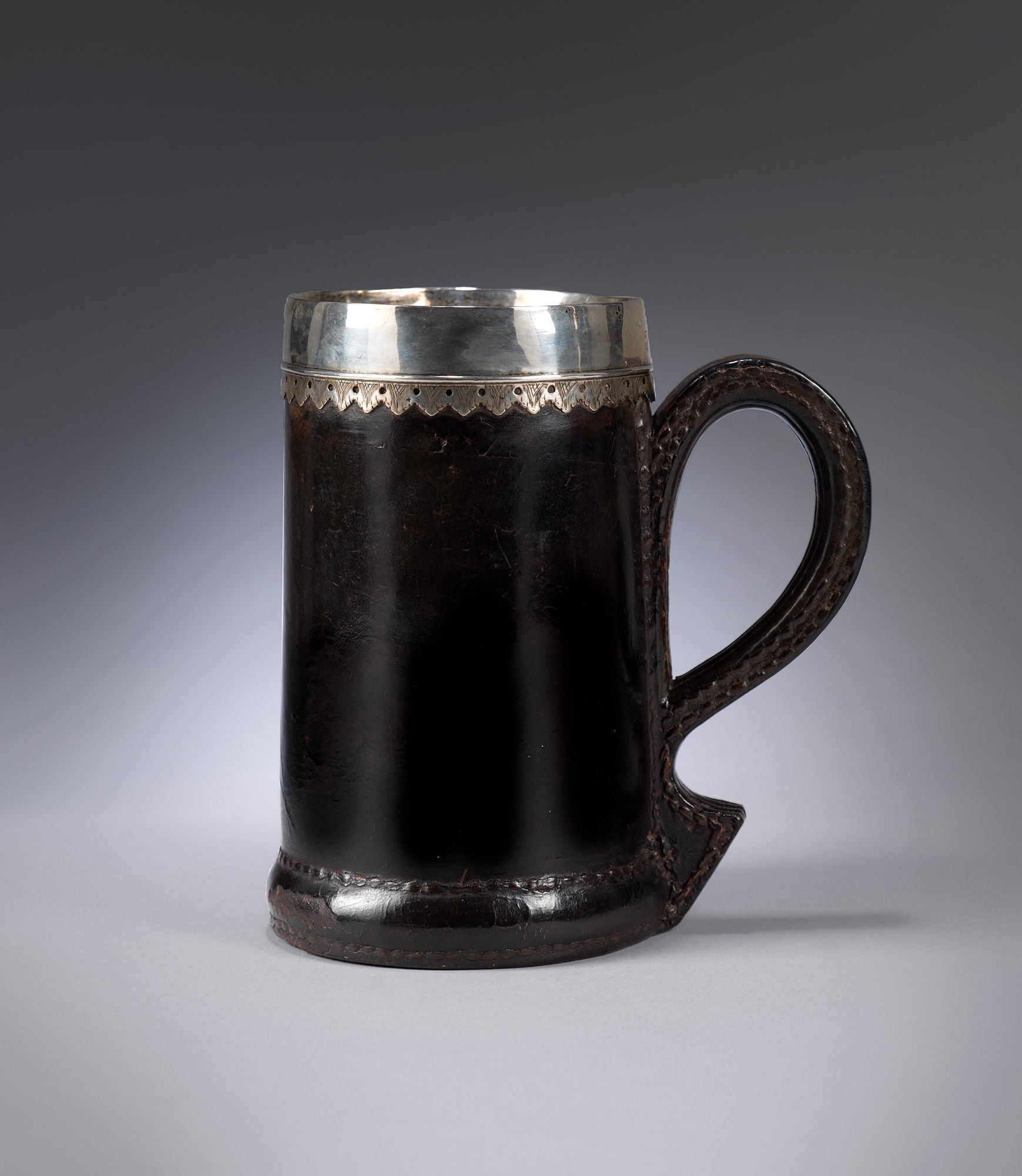 Exemplary Early Silver Mounted "Black Jack" or Tankard