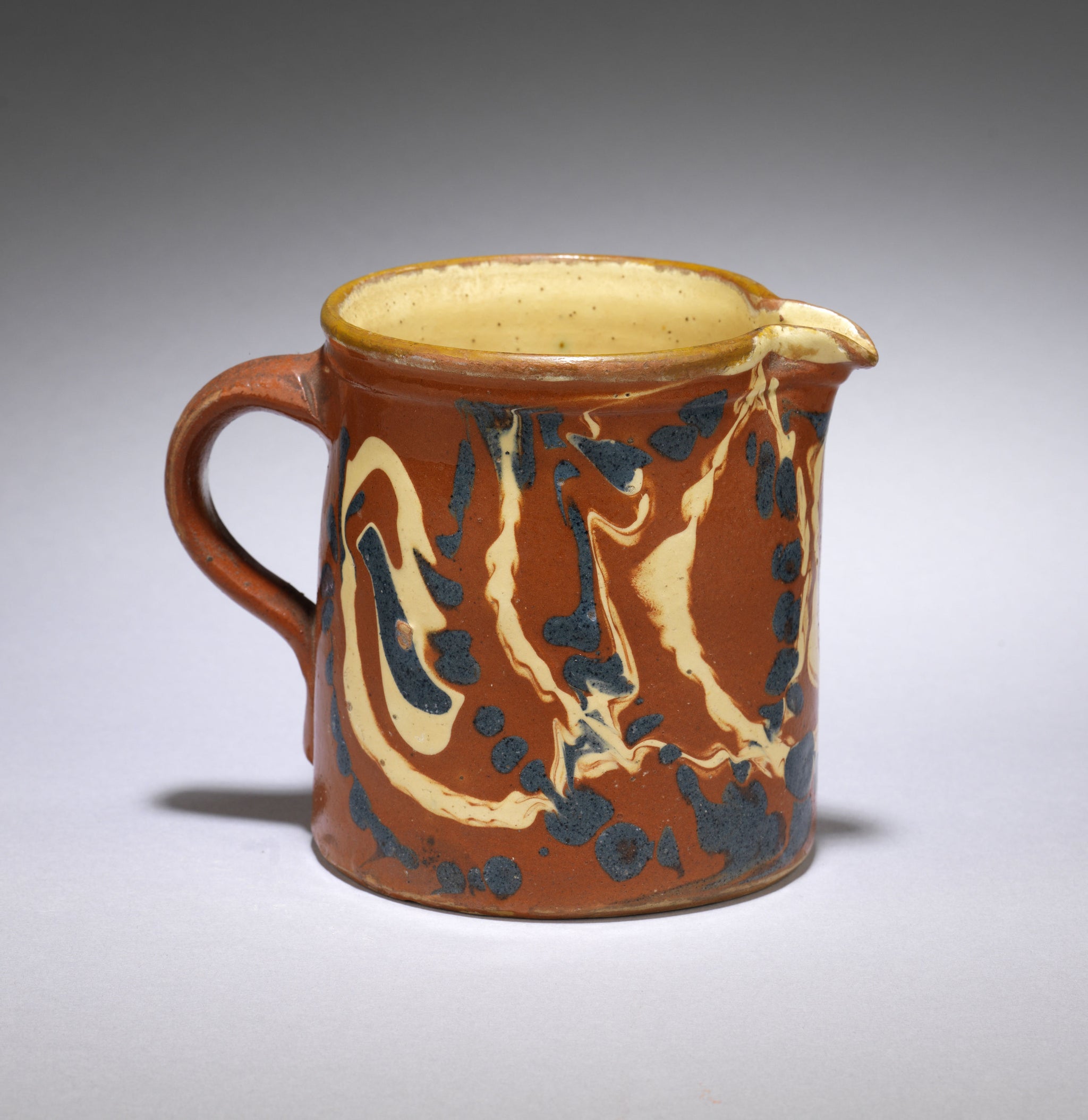 Tapered Cylindrical Loop Handled Slipware Pitcher 