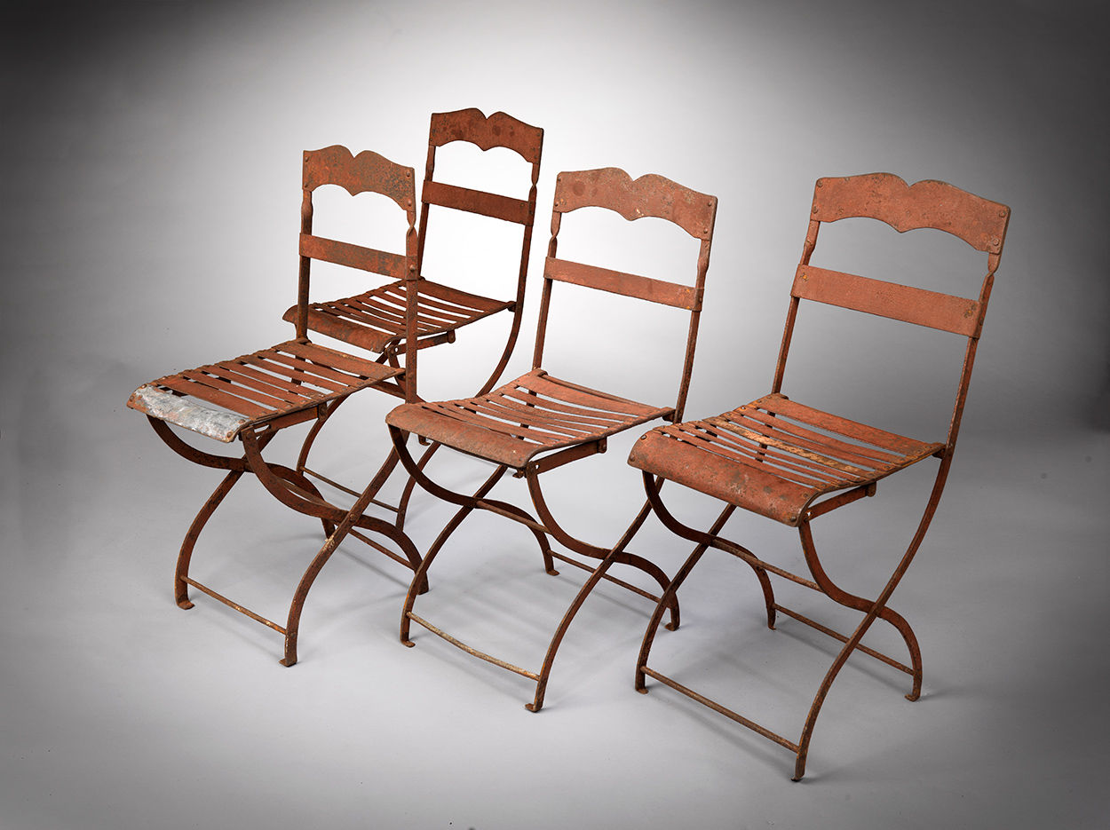 A Group of Four Folding Garden Chairs