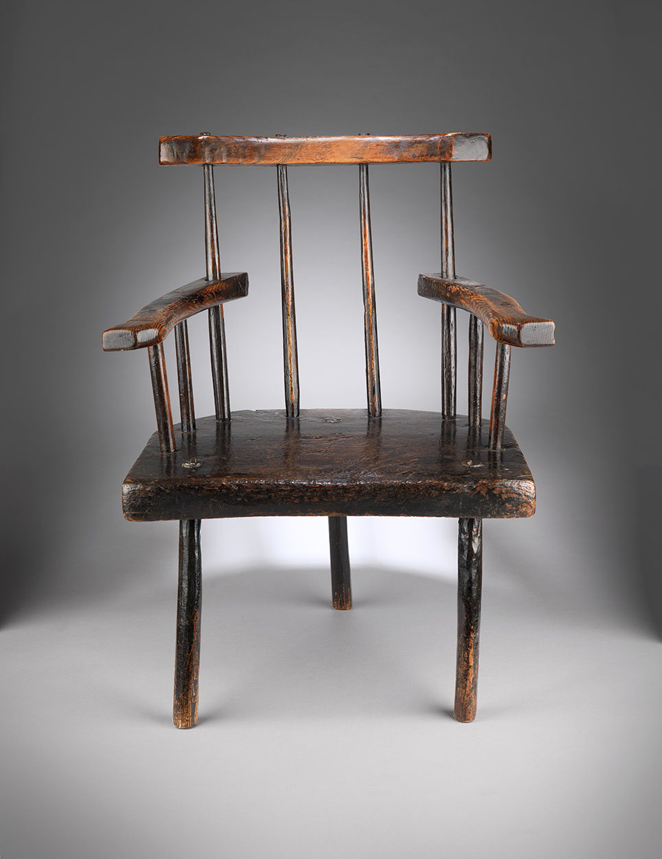 Sculptural Three-Legged Primitive Comb Back Windsor Chair