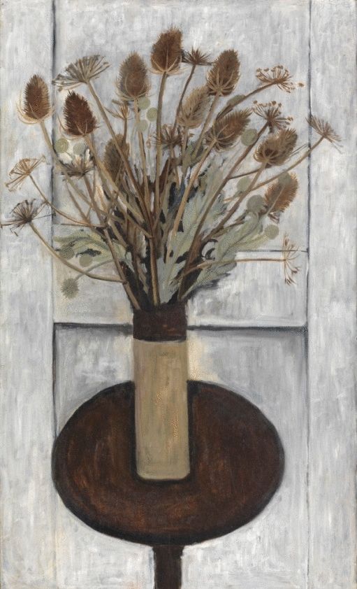 Vase of Tall Dried Flowers on the Round Table