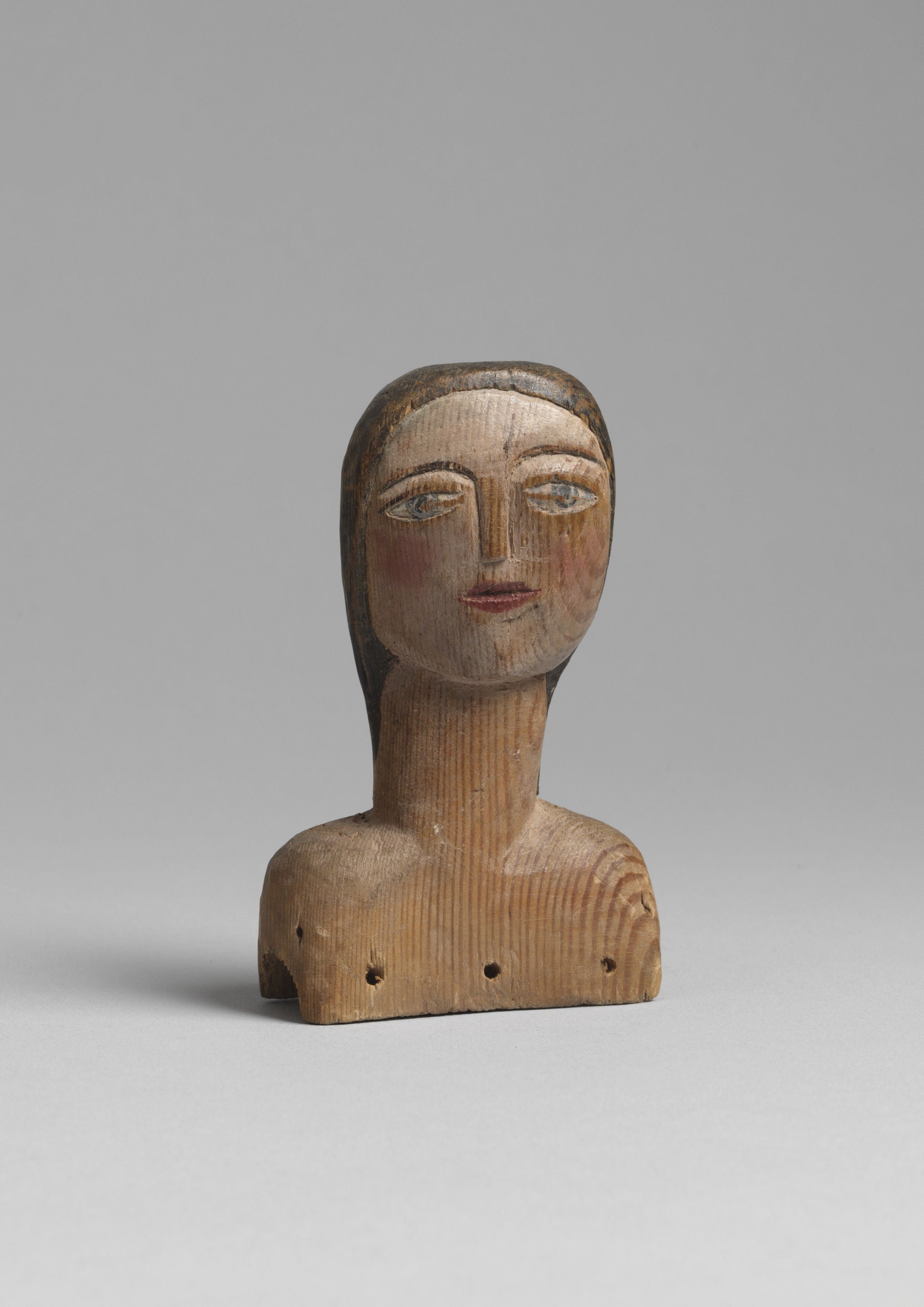 Sculptural Naive Doll's Head.