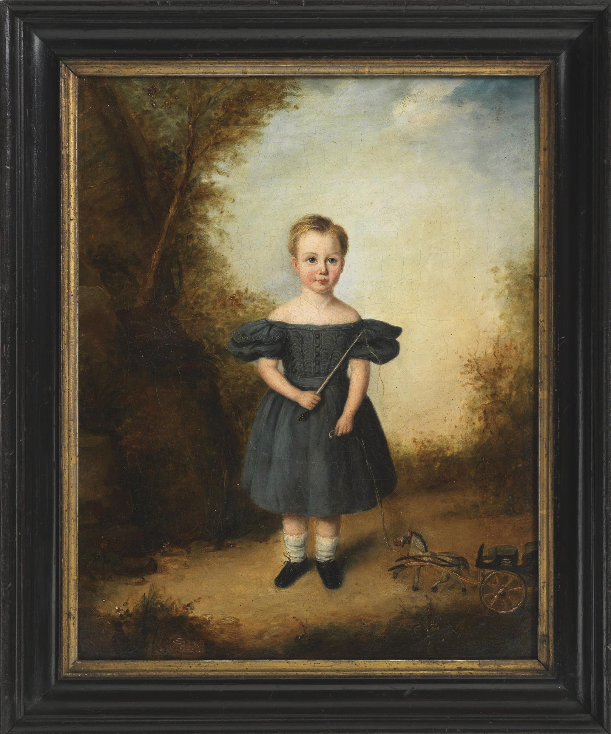 Portrait Of A Child With Toy Horse and Cart