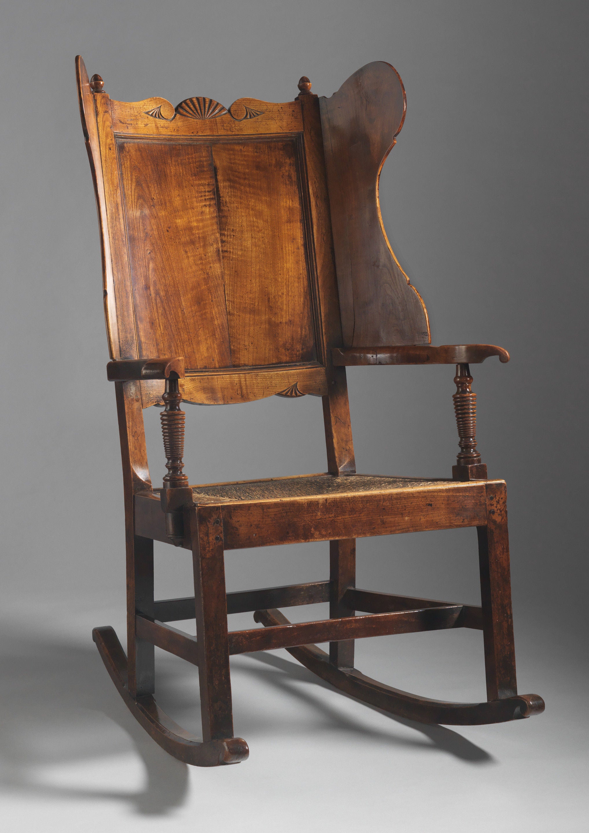 Antique wingback top rocking chair