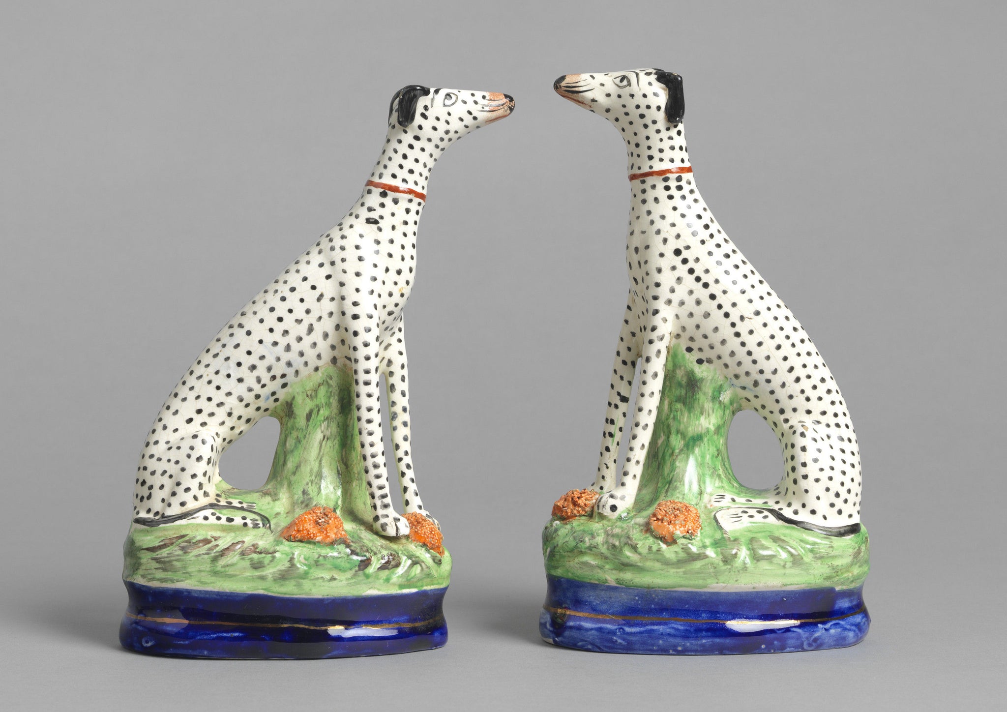 Pair Of Seated Dalmations
