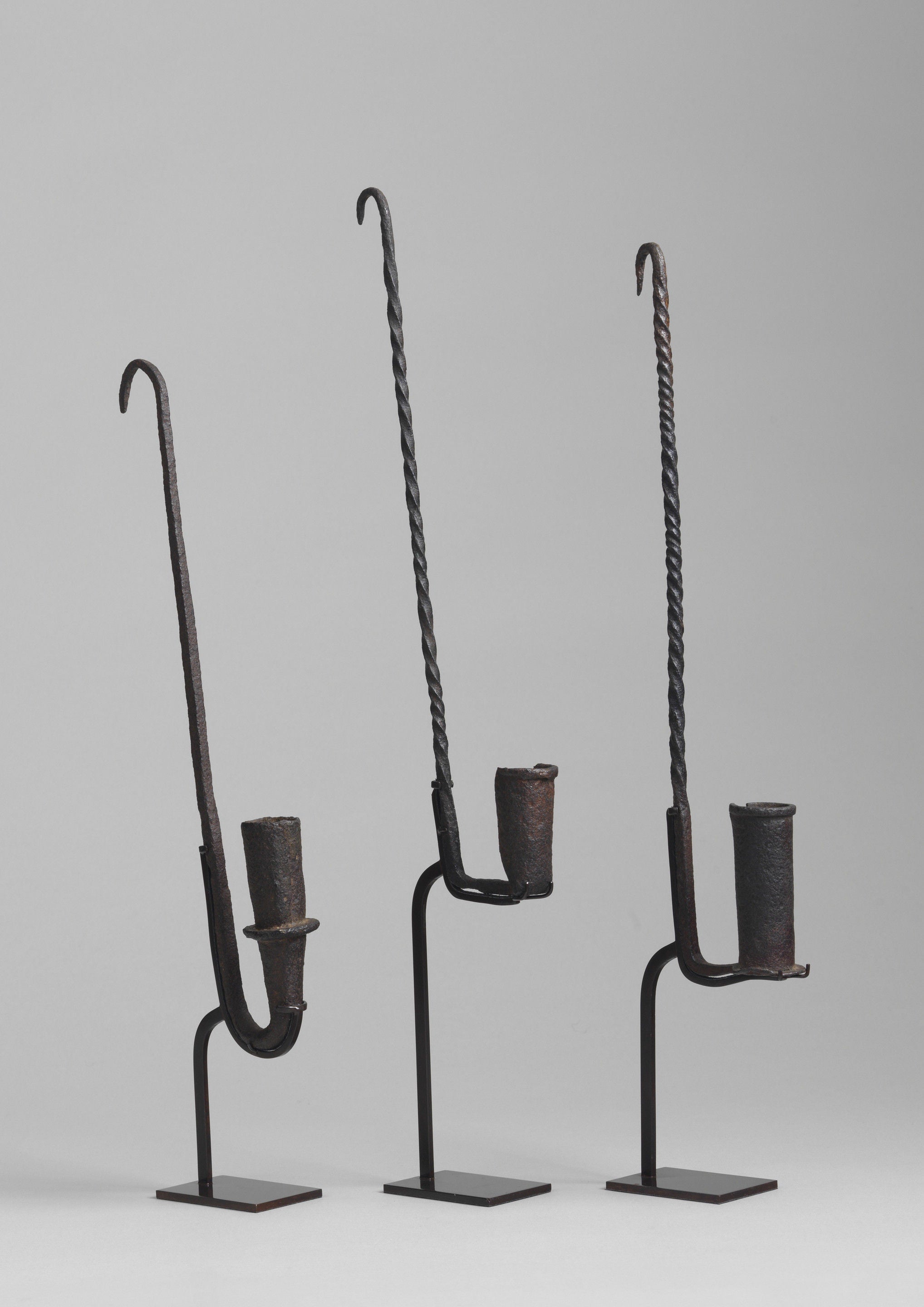 Collection of Three Early Pendant Candleholders