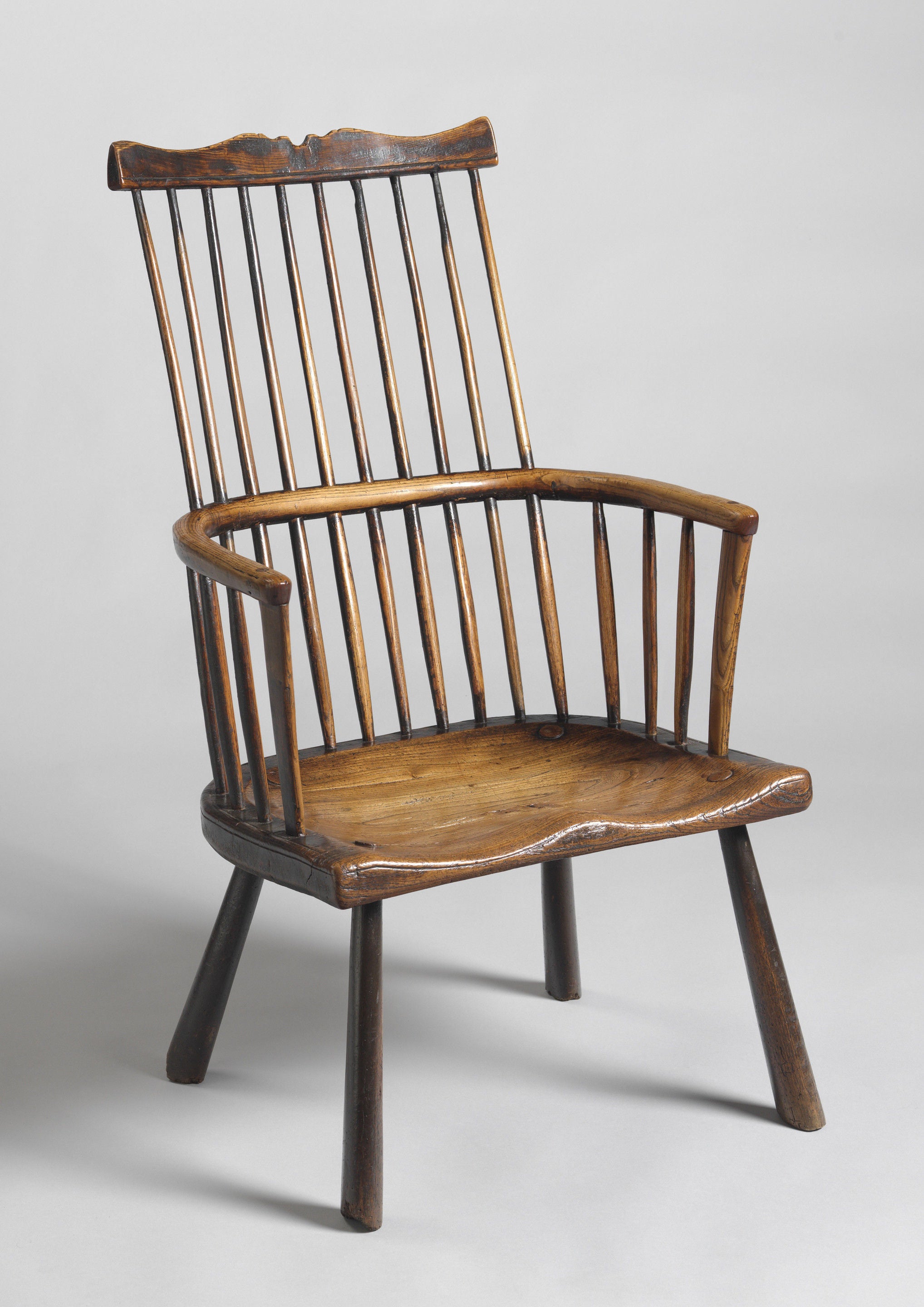 A Rare Early Comb Back Windsor Chair