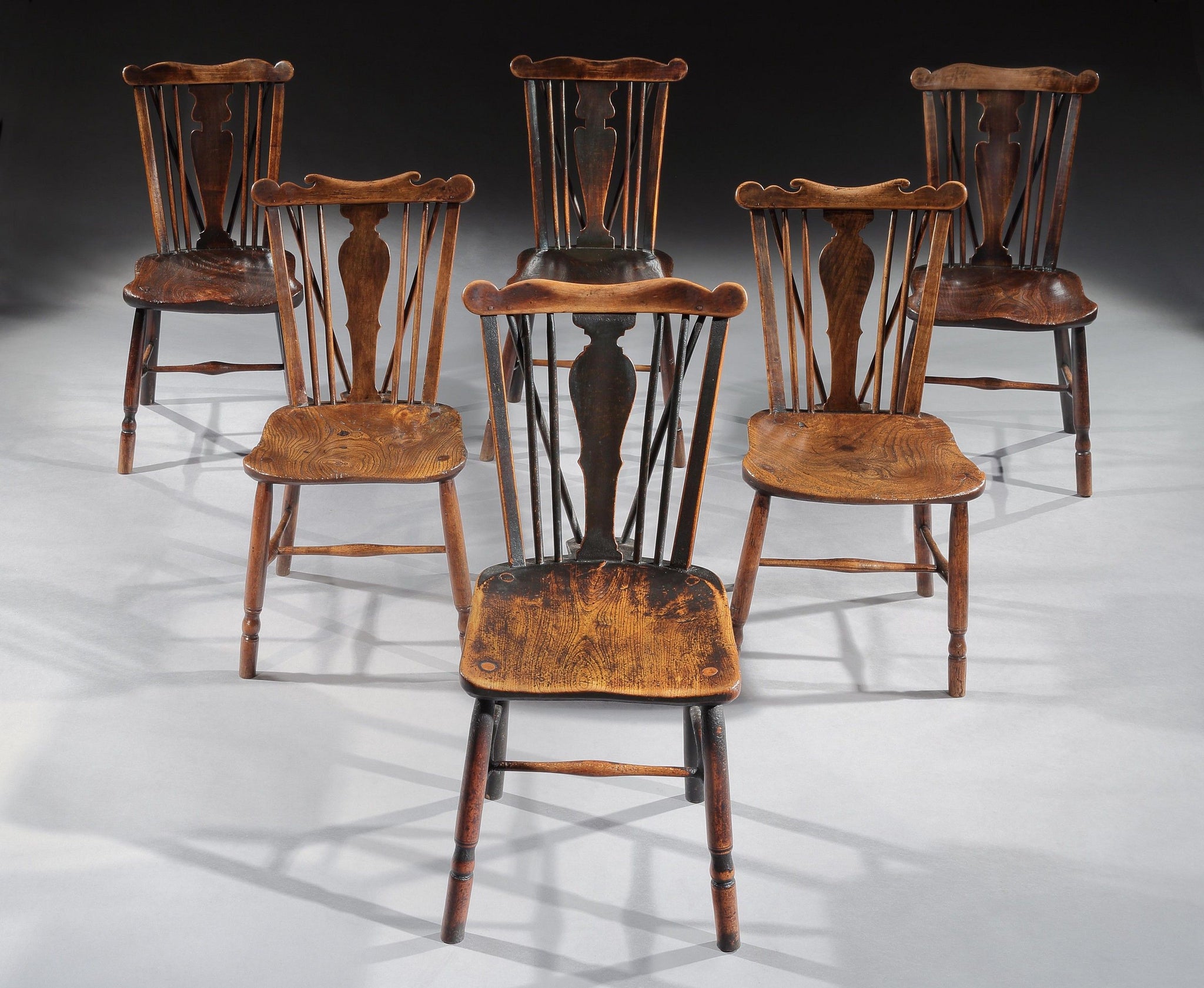 A Good Matched Set of Six Comb Back Windsor Chairs